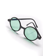 Wicked green glasses used in One Short Day scene